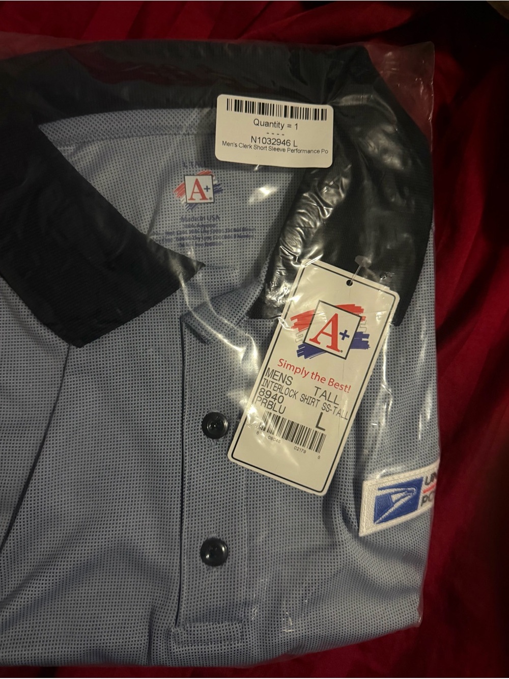 USPS Men’s Performance Polo Shirt in Light Blue with Black Collar